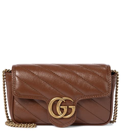 12128209598082 gucci brown|GG Marmont small shoulder bag in brown velvet .